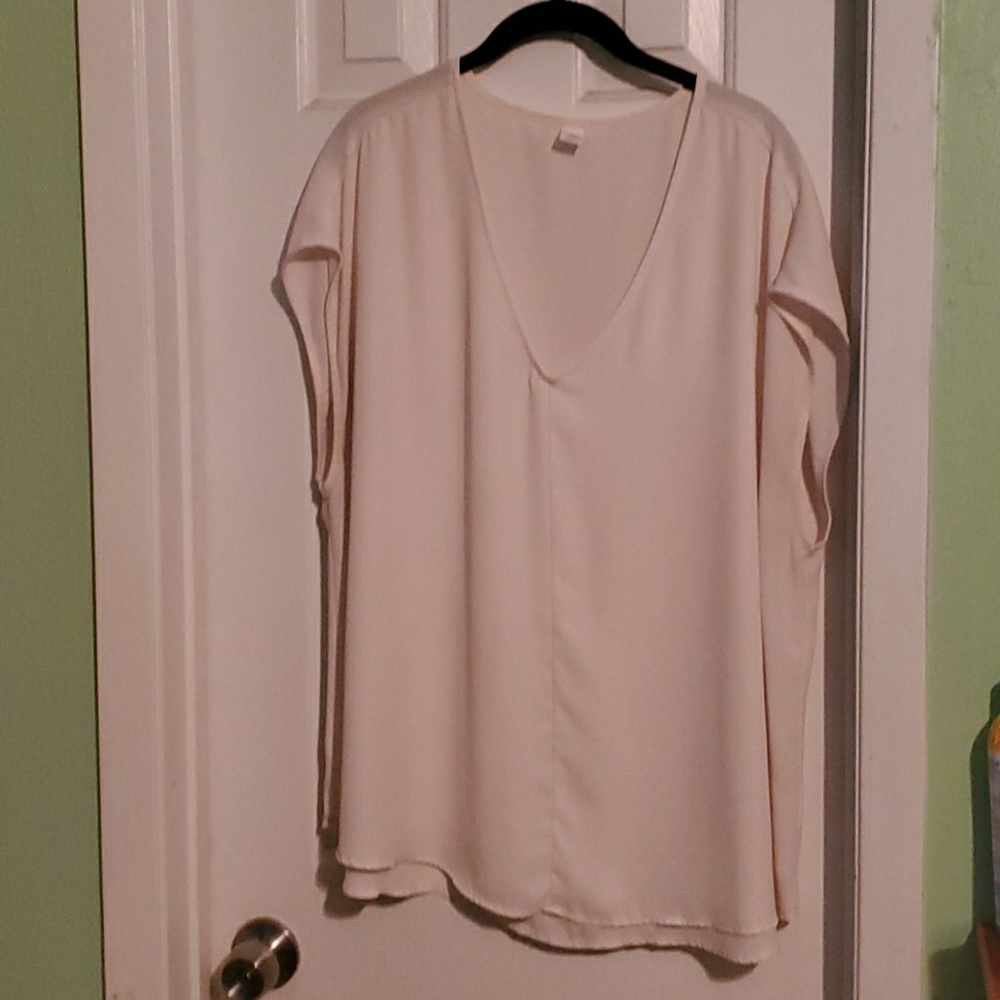 Cream colored short sleeve sheer shirt